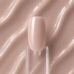 Rubber Base Toffify N9 aplicată pe o mostră ovală de culoare pentru unghii, cu detaliul nuanței și texturii Toffify în fundal